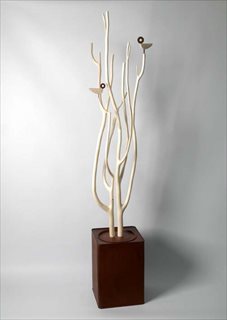 Pair [2010] poplar, found tin, steel + brass 143x26x43cm